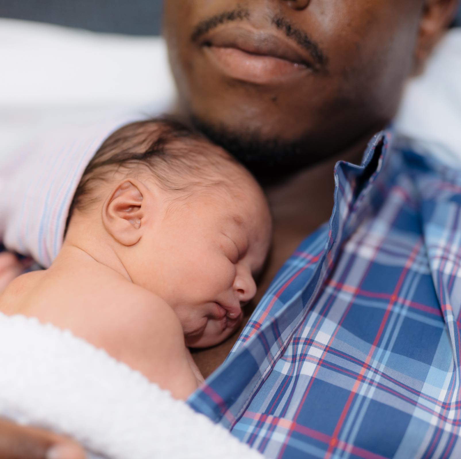 This dad with a newborn baby could appreciate the gift of house cleaning with Zerorez Calgary to ease the transition.