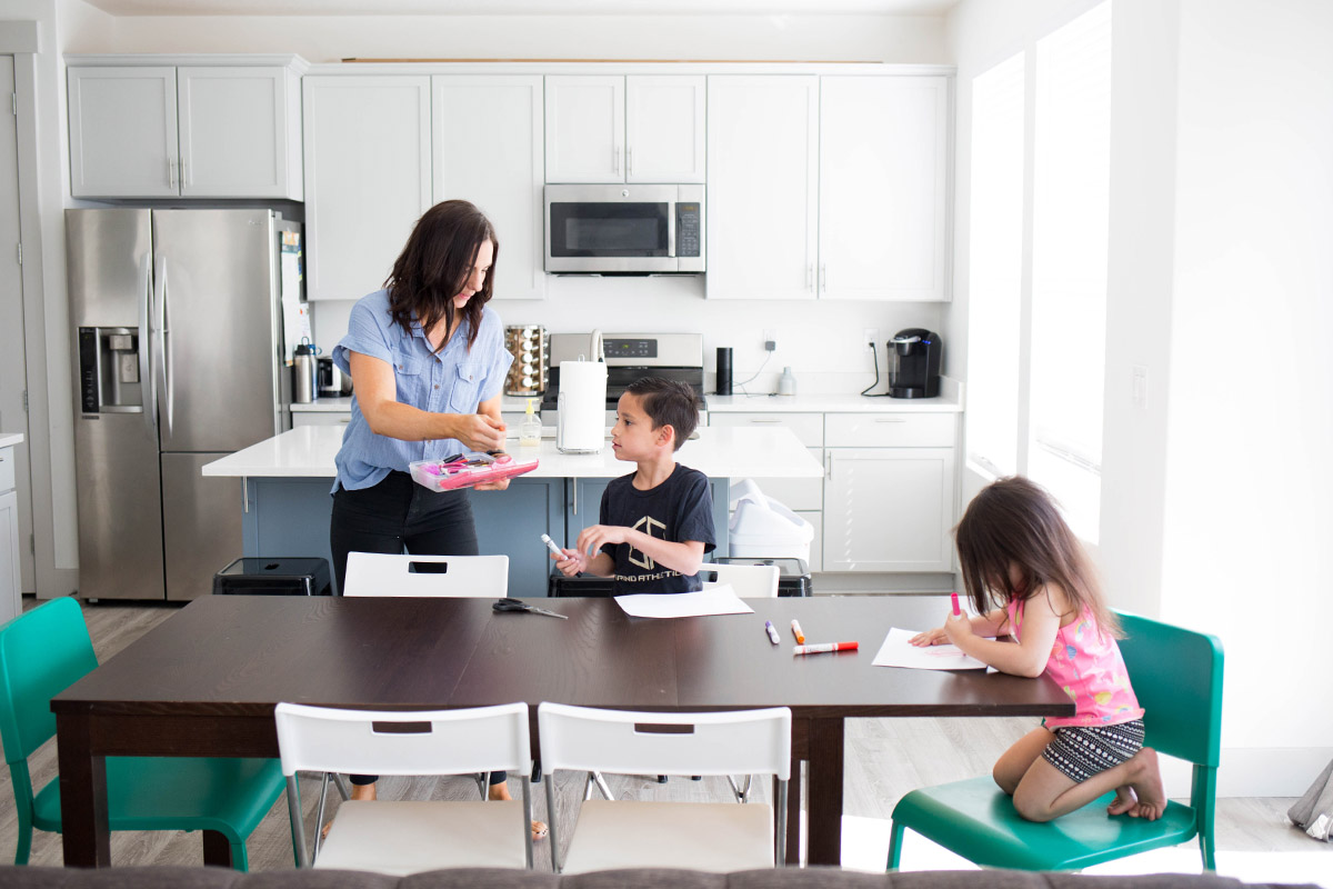 A family makes memories in a spotless kitchen cleaned by Zerorez Calgary.